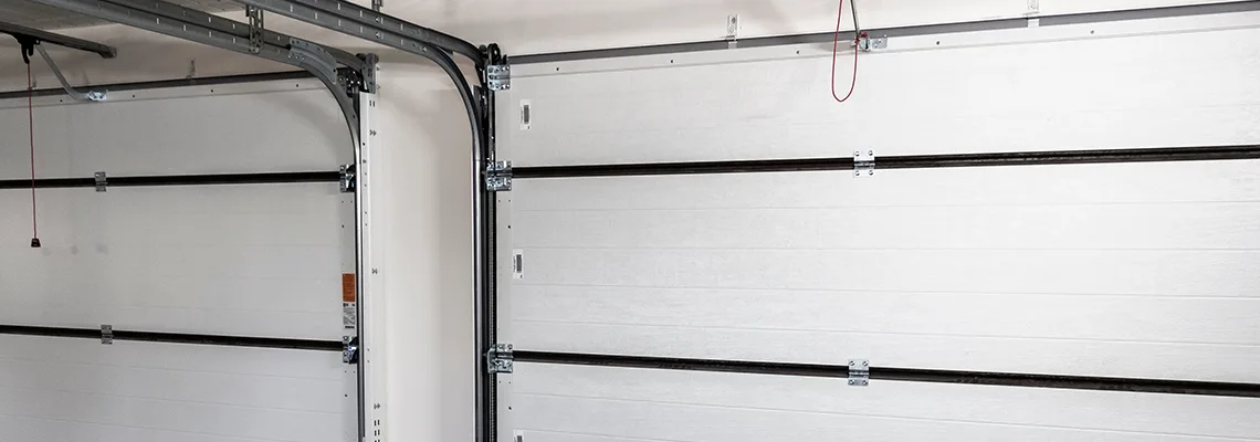 Fix Folding Garage Door Jerking in Springfield, Illinois
