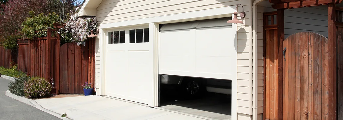 Fix Metal Garage Door Jerking in Springfield, Illinois